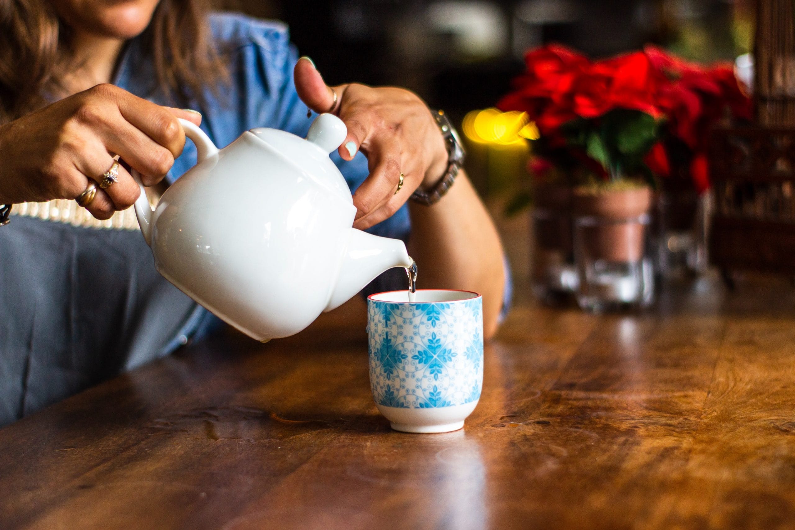 woman pouring tea